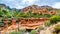 The colorful sandstone mountains and canyon carved by Oak Creek at famous Slide Rock State Park along Arizona SR89A