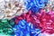 Colorful satin bows in a pile