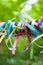 Colorful satin ribbons tied by tourists for good luck. Close-up photo. The background is in the focus