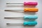 Colorful screwdrivers symetrically lined up