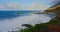 Colorful sea beach, waves foaming and splashing on the rocky shoreline. Ocean waves in open sea at Tenerife north, Anaga