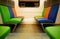 Colorful seats in train carriage background