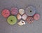 Colorful seaurchins and shells on wet sand beach