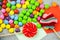 Colorful selection of candy treats laid out on multicolored sticky notes