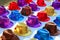 Colorful sequins hats in rows in outdoor market