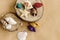 Colorful shells and sea star on sandy wooden background, summer