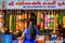 A colorful shop in Little India, Singapore, selling floral garlands.