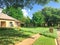 Colorful sidewalk with blossom bluebonnet wildflower at residential neighborhood in Dallas, Texas, USA