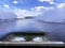 A colorful sight: cooling fountains of the Atomic Station, Heat of a power plant against a background of white clouds, blue sky