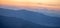 Colorful silhouettes of mountains at sunset in summer