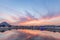 Colorful sky and clouds over Pushkar, Rajasthan, India. Temples, buildings and colors reflecting on the holy water of the lake at