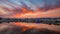 Colorful sky and clouds over Pushkar, Rajasthan, India. Temples, buildings and colors reflecting on the holy water of the lake at