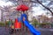 colorful slide on playground with cherry blossom flower