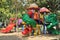 Colorful sliders in public playground in garden.