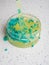 Colorful slime inside plastic box. Kids gunk toy  over white background