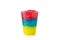 Colorful slushie of differents flavors with straw in plastic cup