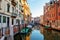 Colorful small canal in Venice Italy