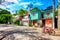 Colorful small houses along a cobbled street in Buzios, Brazil