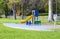 Colorful small slider playground on yard in the park