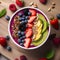 A colorful smoothie bowl topped with fresh fruits and nuts1