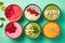 colorful smoothie bowls arranged on bright coloured backgrounds