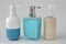 Colorful soap dispenser for bathrooms or kitchen sinks on a white background