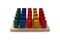 Colorful socket cylinder wooden blocks isolated on a white background. Montessori children educational toys