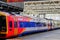 Colorful Southwest Train sitting in Waterloo Station, London.