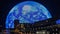 The colorful Sphere at The Venetian Resort surrounded by buildings at night in Las Vegas Nevada