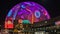 The colorful Sphere at The Venetian Resort surrounded by buildings at night in Las Vegas Nevada