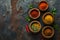 Colorful Spices in Wooden Bowls on Rustic Background