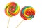 Colorful spiral lollipops on white background