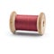 Colorful Spool sewing threads on white background