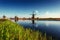 Colorful spring day with traditional Dutch windmills canal in Ro