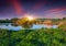 Colorful spring landscape on fishing pond.