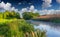 Colorful spring landscape on misty river