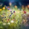 Colorful spring summer landscape with wild flowers in meadow in nature glow in sun. Selective focus, shallow depth of field