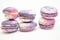 Colorful stacked French Macarons on white background