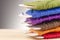 Colorful stacking cotton yarn wool over beautiful reverberation gradient background