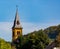 Colorful steeple pierces the sky above Grevenmacher
