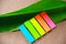 Colorful sticky note pad with the green leaf