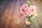 Colorful still life with roses in glass vase