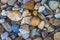 colorful stones background, colored beach stones background, small stones