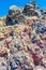 Colorful stones rocky lunar landscape Nea Kameni volcanic island Greece
