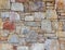 Colorful stonewall close up, seamless natural background