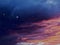 Colorful storm clouds at sunset and night sky with glowing stars nature illustration background celestial galaxy design