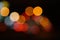 Colorful street circle bokeh light dark background