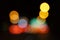 Colorful street circle bokeh light dark background