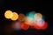 Colorful street circle bokeh light dark background