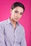 Colorful studio portrait of young attractive woman with a neutral expression